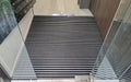 Insitu Product image of Aluminium Architectural Matting in Black in entrance recess