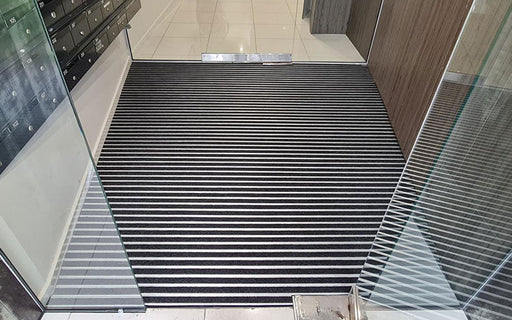 Insitu Product image of Aluminium Architectural Matting in Black in entrance recess