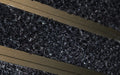 Close up image of Black Reno inserts in Bronze ARCHIMAT aluminium architectural matting