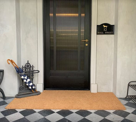 Insitu product image of natural coir matting at front entrance of house