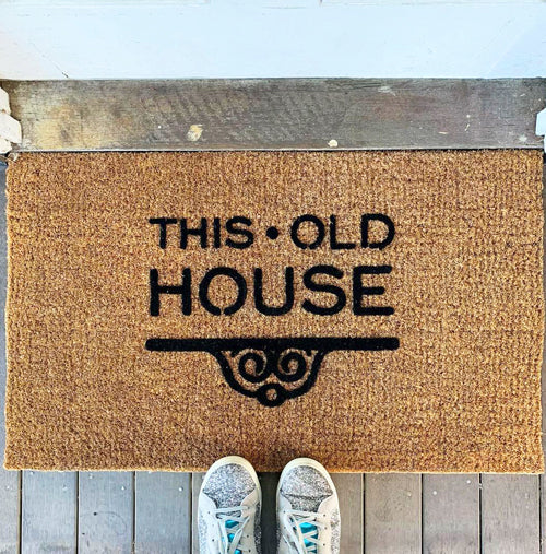 Insitu image of Coir Embossed Logo Mat with Black Embossed Logo for residential home