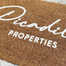 Close up image of Coir Embossed Logo Mat with White Embossed Logo