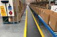 Insitu product image of black and yellow Diamond Plate Gel Anti-Fatigue Mat in packing warehouse