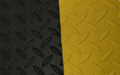 Close up mage of Anti-fatigue mat called Diamond Foam Mat in black with yellow safety edges