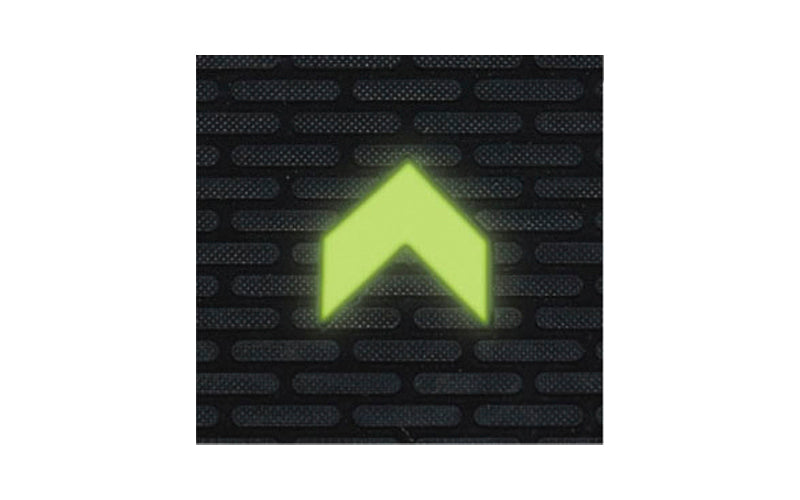 Close up image of what the arrows look like when they glow in the dark in case of a power outage.