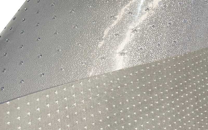 Close up product image of backing of vinyl Hoist Mat with its anti-slip underside anchors