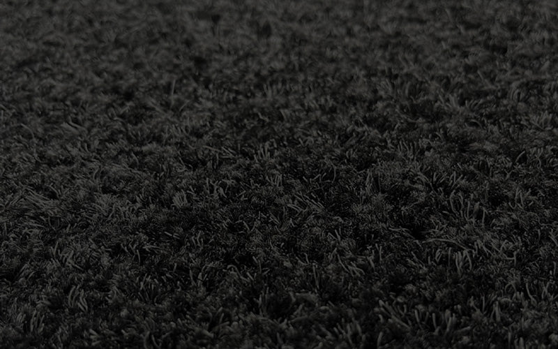 Close up image of the textured surface of the obex entry tile cut x perfect for entryways