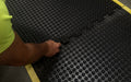 Insitu of someone easily placing the mats together securely like a puzzle