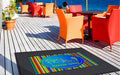 Insitu image of a Rubber Scraper Logo Mat as a beach club and restaurant.