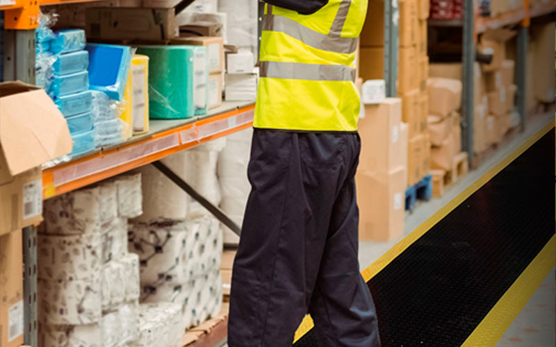 Insitu of the safety alert mat used in a warehouse as if has anti-fatigue properties