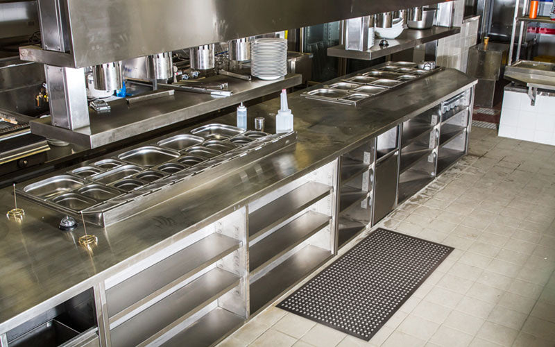 Insitu Product Image of black rubber Safewalk Standard Anti-fatigue mat in commercial kitchen