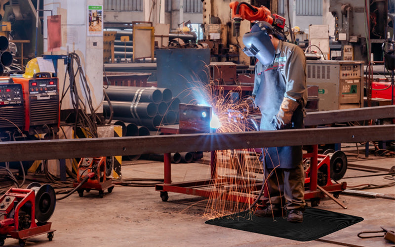 Initu image of the sparksafe mat for industrial areas and perfect for welding