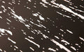 close up of the black with white pattern tile top premier mat.