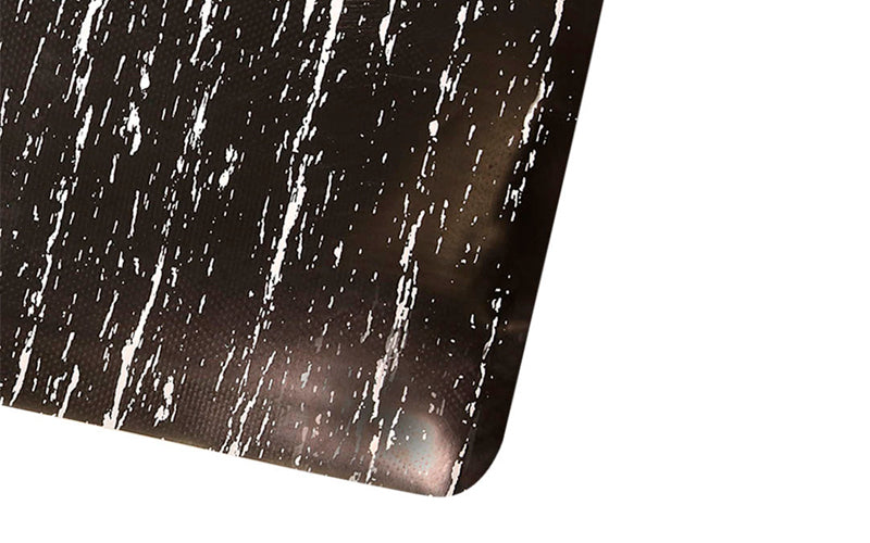 Corner image of the bevelled safety edges of the tile top premier mat to reduce trips and slips.