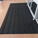 Product image of charcoal Waterhog Eco Elite Entrance Mat in a recess