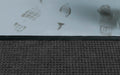 Close up image of the waterhog material and the sticky mat and how they differ in appearance and texture.