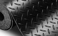 Close up image of the diamond pattern on the diamond plate vinyl runner