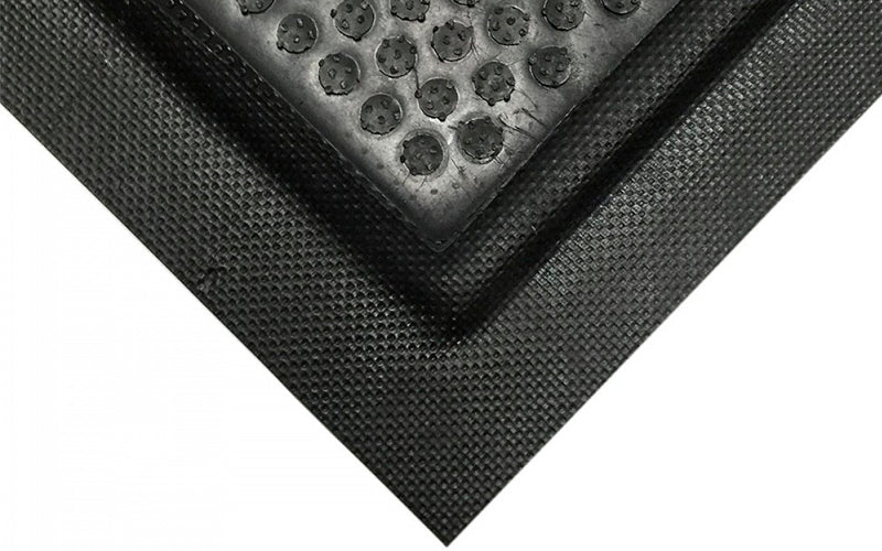 Corner image of the happy feet grip top in black nitrile rubber which is Chemical, animal fat and petroleum resistant