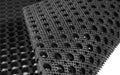 Close up of the raised studded backing on the rubber honeycomb heavy duty drainage mat.