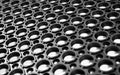 Close up image of the honeycomb heavy duty drainage mat that is fully rubber.