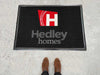 Full product image of polypropylene, black base Superguard Logo Inlay Mat for business