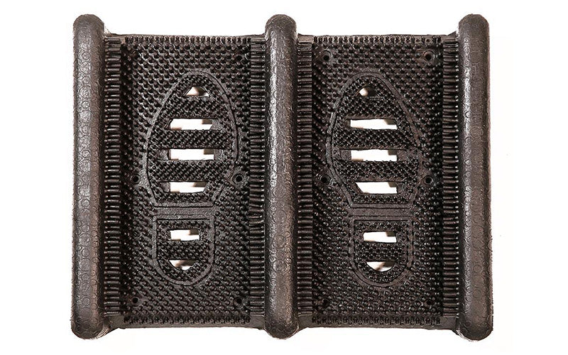 Full product image of black rubber Mud Chucker that scrapes mud off shoes