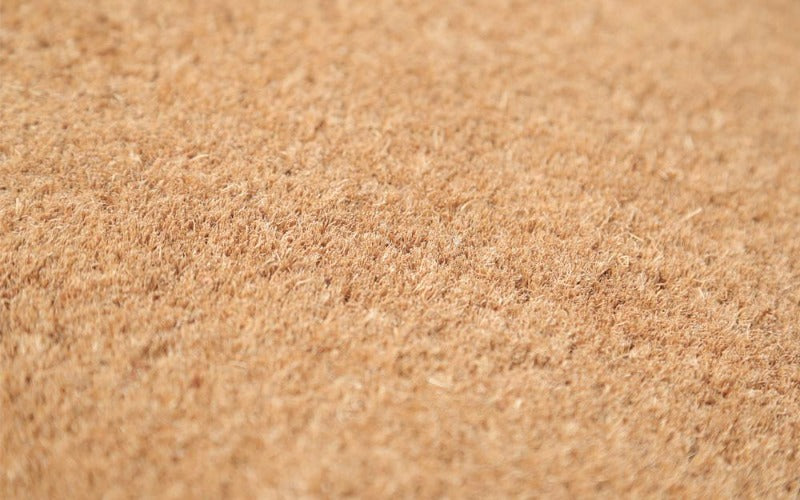 Close up image of natural coir doormat
