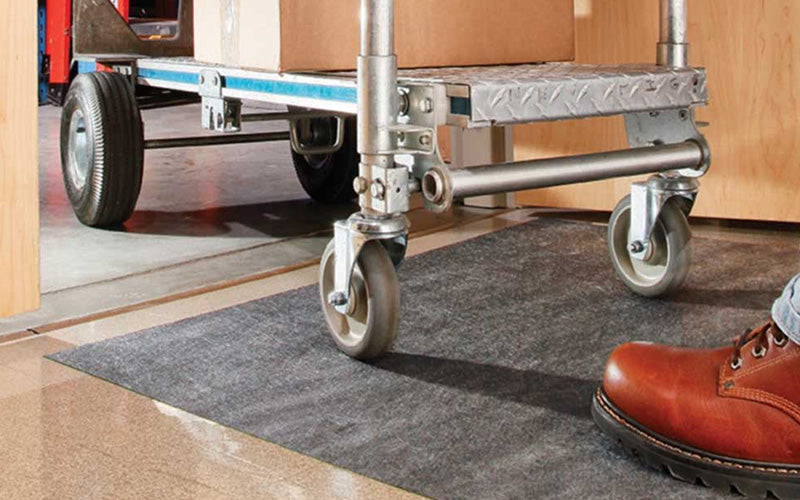 Insitu images of SmartGrip Roll Mat with trolley rolling over it