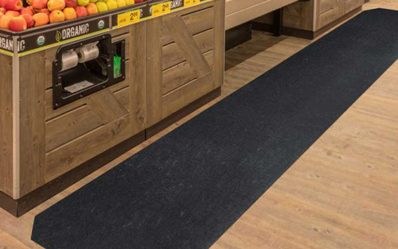 Insitu image of the SmartGrip Mat Roll used in a supermarket.