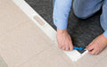 Insitu picture of the Safety Cutting tool being used on the SmartGrip Roll Mat.