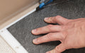 Insitu picture of the Safety Cutting tool being used on the SmartGrip Roll Mat.