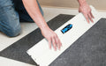 Insitu picture of the SmartGrip Safety Knife and Cutting tool on a SmartGrip Mat.